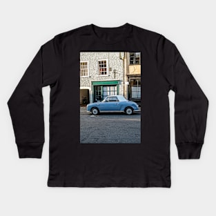 Classic car parked up in a quiet street in Norwich Kids Long Sleeve T-Shirt